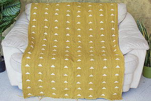 Triangles on Mustard Mudcloth