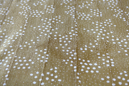 White Dot starscape on Mustard Mudcloth