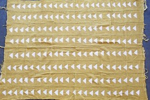 Triangles on Mustard Mudcloth