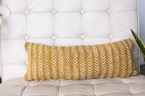 Small Chevrons On Mustard Mudcloth Lumbar Fabric.